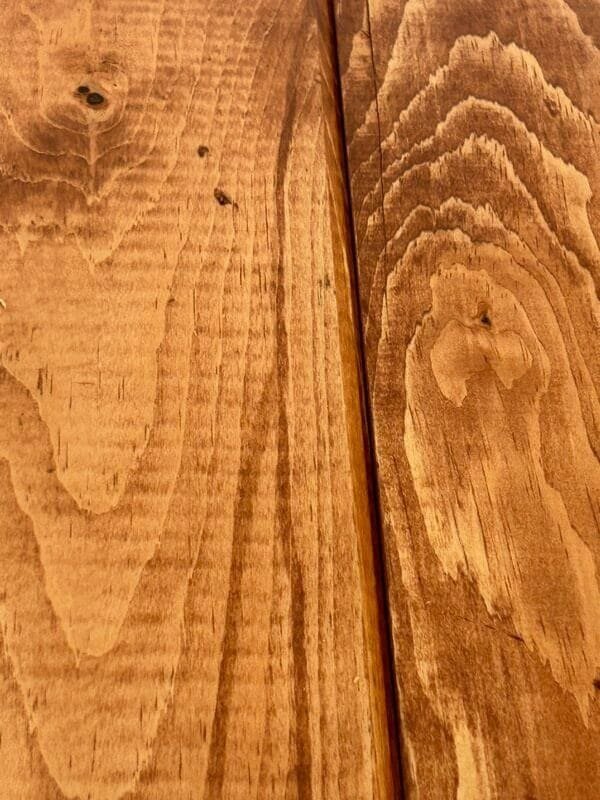 a close up of a wood surface